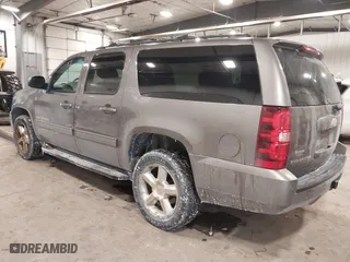 2013 Chevrolet Suburban LT with VIN 1GNSKJE76DR375916, listed as a IAAI auction lot 41588724 with 281,808 mi miles. Bid and sale history available at carsss.com. Image 3.