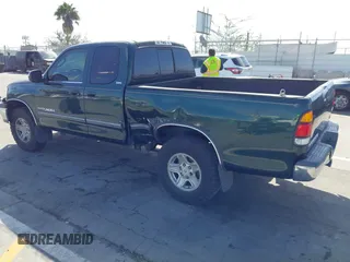 2000 Toyota Tundra SR5 with VIN 5TBRT3417YS122889, listed as a IAAI auction lot 41711107 with 288,475 mi miles and . Bid and sale history available at DreamBid. Image 3.