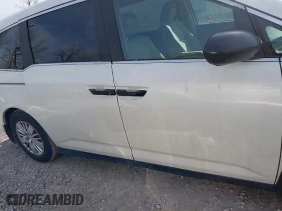 2014 Honda Odyssey LX with VIN 5FNRL5H24EB001551, listed as a IAAI auction lot 41879040 with 119,200 mi miles and . Bid and sale history available at DreamBid. Image 13.