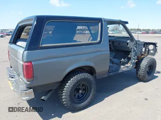 1988 Ford Bronco XL with VIN 1FMEU15N3JLA69197, listed as a IAAI auction lot 42082657 with 287,213 mi miles. Bid and sale history available at carsss.com. Image 4.