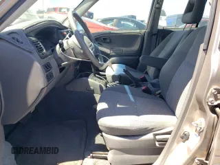 2002 Chevrolet Tracker z VIN 2CNBJ13C026951435, wystawiony jako Copart lot #57782784 z przebiegiem 132 279 mil mil oraz Szkody całkowita. Historia ofert i sprzedaży dostępna na DreamBid. Obrazek 7.