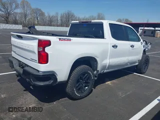 2021 Chevrolet Silverado 1500 Custom Trail Boss with VIN 1GCPYCEF1MZ413908, listed as a IAAI auction lot 41891660 with 88,335 mi miles and . Bid and sale history available at DreamBid. Image 4.