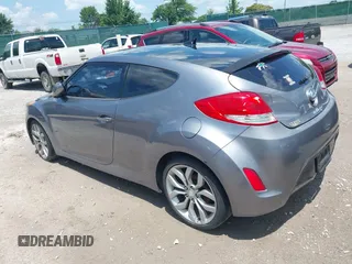 2012 Hyundai Veloster w/Black Int with VIN KMHTC6ADXCU061325, listed as a IAAI auction lot 42556398 with 122,954 mi miles and . Bid and sale history available at DreamBid. Image 3.