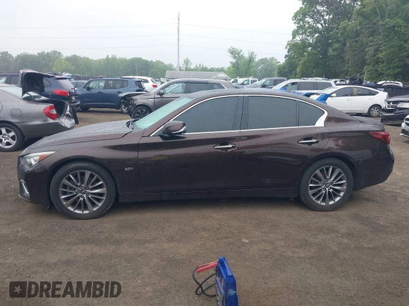 2019 Infiniti Q50 Luxe z VIN JN1EV7AR6KM550427, wystawiony jako IAAI lot #42225183 z przebiegiem 76 144 mil mil oraz . Historia ofert i sprzedaży dostępna na DreamBid. Obrazek 13.