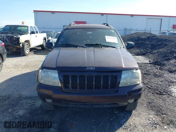 2004 Jeep Grand Cherokee with VIN 1J8GX48S24C266933, listed as a IAAI auction lot 41497122 with 200,899 mi miles and . Bid and sale history available at DreamBid. Image 15.