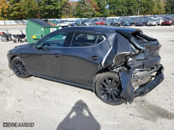 2020 Mazda Mazda3 Hatchback Premium Package with VIN JM1BPBNM7L1155767, listed as a Copart auction lot 75656714 with 57,573 mi miles and Salvage Title. Bid and sale history available at carsss.com. Image 2.