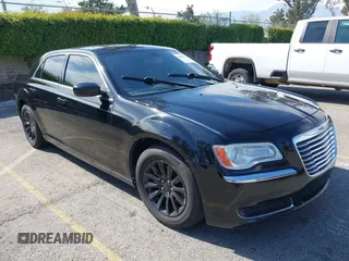 2014 Chrysler 300 with VIN 2C3CCAAG9EH264914, listed as a IAAI auction lot 42003052 with 103,789 mi miles. Bid and sale history available at carsss.com. Image 1.
