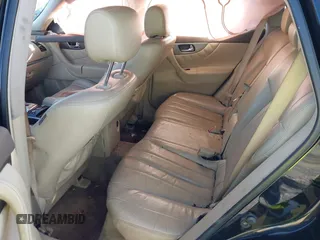 2014 Infiniti QX70 with VIN JN8CS1MU2EM451932, listed as a IAAI auction lot 41439834 with 125,781 mi miles and . Bid and sale history available at DreamBid. Image 8.