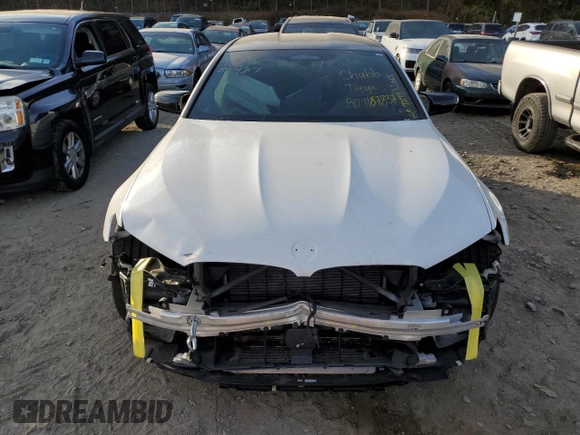 2021 BMW M5 with VIN WBS83CH01MCF15654, listed as a Copart auction lot 77427464 with 41,919 mi miles and Salvage Title. Bid and sale history available at carsss.com. Image 5.