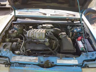 1992 Ford Tempo z VIN 1FAPP36U6NK188935, wystawiony jako IAAI lot #42133598 z przebiegiem 31 673 mil mil oraz . Historia ofert i sprzedaży dostępna na DreamBid. Obrazek 10.
