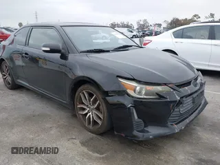 2014 Scion tC z VIN JTKJF5C71E3078634, wystawiony jako IAAI lot #42154039 z przebiegiem 174 063 mil mil oraz . Historia ofert i sprzedaży dostępna na DreamBid. Obrazek 1.