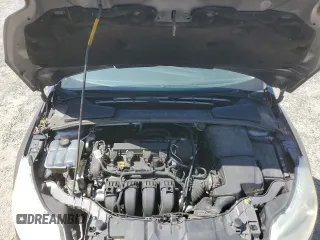 2014 Ford Focus SE z VIN 1FADP3K2XEL457861, wystawiony jako Copart lot #59381205 z przebiegiem 110 430 mil mil oraz Szkoda całkowita • Salvage title. Historia ofert i sprzedaży dostępna na DreamBid. Obrazek 11.