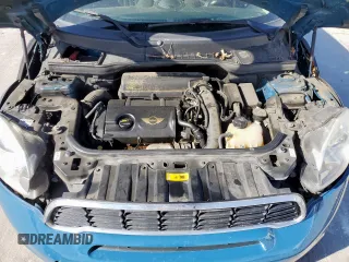 2012 MINI Countryman S with VIN WMWZC3C5XCWM27675, listed as a Copart auction lot 49676205 with 111,499 mi miles and Salvage title. Bid and sale history available at DreamBid. Image 11.
