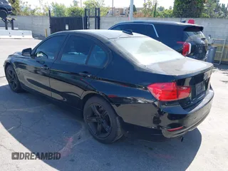 2014 BMW 3 Series 320i with VIN WBA3B1G5XENS80130, listed as a IAAI auction lot 42304306 with 125,743 mi miles and . Bid and sale history available at DreamBid. Image 3.