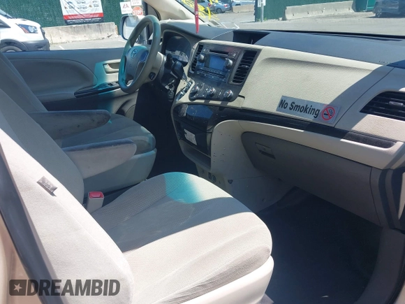 2014 Toyota Sienna L with VIN 5TDZK3DC9ES518653, listed as a IAAI auction lot 42767591 with 261,730 mi miles and . Bid and sale history available at DreamBid. Image 5.