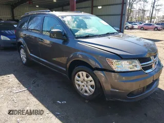 2016 Dodge Journey SE with VIN 3C4PDCAB6GT104588, listed as a IAAI auction lot 41823732 with 133,819 mi miles. Bid and sale history available at carsss.com. Image 1.