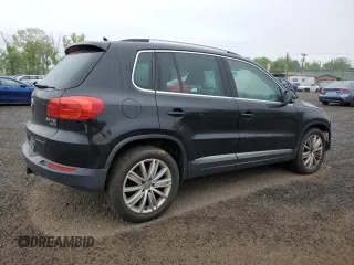 2013 Volkswagen Tiguan SE z VIN WVGBV7AX6DW550316, wystawiony jako Copart lot #56964595 z przebiegiem 157 526 mil mil oraz Szkoda całkowita • Salvage title. Historia ofert i sprzedaży dostępna na DreamBid. Obrazek 3.