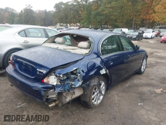 2002 Jaguar S-Type with VIN SAJDA03NX2FM32537, listed as a IAAI auction lot 40774935 with Not Provided miles and . Bid and sale history available at DreamBid. Image 4.