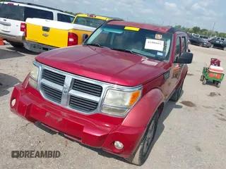 2008 Dodge Nitro SXT z VIN 1D8GT28K18W259419, wystawiony jako IAAI lot #42406662 z przebiegiem 197 382 mil mil oraz . Historia ofert i sprzedaży dostępna na DreamBid. Obrazek 2.