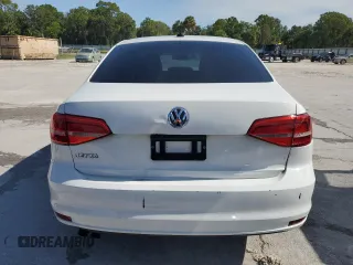 2015 Volkswagen Jetta S with VIN 3VW2K7AJ9FM323047, listed as a Copart auction lot 59098565 with 169,648 mi miles and Salvage title. Bid and sale history available at DreamBid. Image 6.