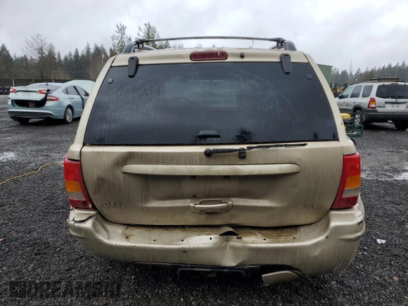 1999 Jeep Grand Cherokee Limited with VIN 1J4GW68N2XC581746, listed as a Copart auction lot 45413775 with 284,226 mi miles and Salvage Title. Bid and sale history available at carsss.com. Image 6.