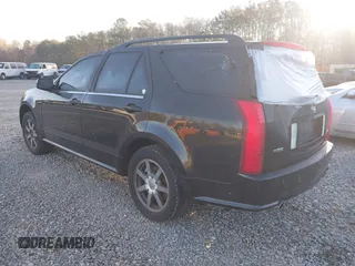 2004 Cadillac SRX with VIN 1GYDE63A040116714, listed as a IAAI auction lot 41828311 with 128,372 mi miles. Bid and sale history available at carsss.com. Image 3.
