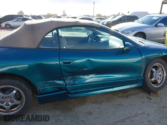 1999 Mitsubishi Eclipse GS-T with VIN 4A3AX55F6XE052978, listed as a IAAI auction lot 41841812 with 92,776 mi miles and . Bid and sale history available at carsss.com. Image 13.