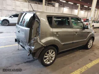 2013 Kia Soul + with VIN KNDJT2A62D7617925, listed as a IAAI auction lot 41117113 with 134,910 mi miles. Bid and sale history available at carsss.com. Image 4.