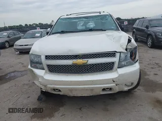 2013 Chevrolet Suburban LTZ with VIN 1GNSCKE00DR209381, listed as a IAAI auction lot 42469271 with Not provided miles and . Bid and sale history available at DreamBid. Image 12.
