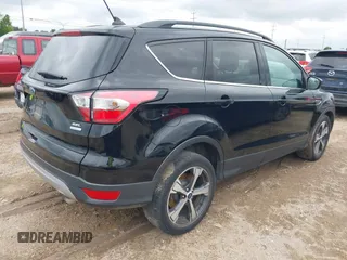 2018 Ford Escape SEL with VIN 1FMCU0HD0JUB24722, listed as a IAAI auction lot 42049106 with 122,400 mi miles and . Bid and sale history available at carsss.com. Image 4.
