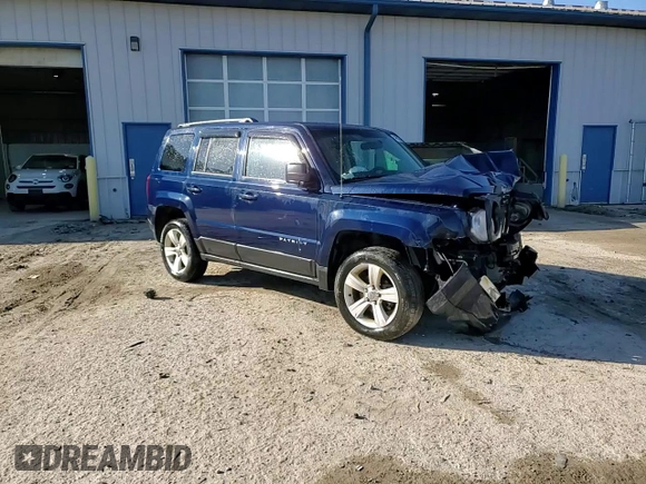 2014 Jeep Patriot Latitude with VIN 1C4NJRFB0ED852882, listed as a Copart auction lot 49674915 with 130,367 mi miles and Salvage title. Bid and sale history available at DreamBid. Image 14.