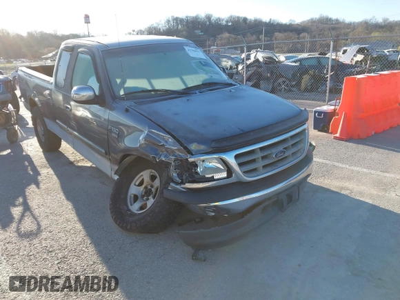 2002 Ford F-150 XL with VIN 1FTRX17L52NA85965, listed as a IAAI auction lot 41796633 with 171,814 mi miles. Bid and sale history available at carsss.com. Image 1.