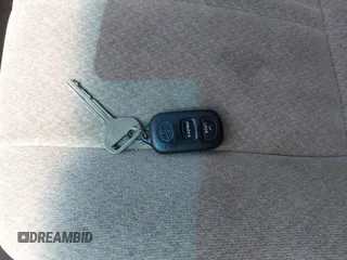 2001 Toyota Camry CE z VIN JT2BG22K310536515, wystawiony jako IAAI lot #42409847 z przebiegiem 205 978 mil mil oraz . Historia ofert i sprzedaży dostępna na DreamBid. Obrazek 11.