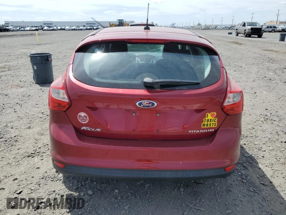 2014 Ford Focus Titanium with VIN 1FADP3N21EL421469, listed as a Copart auction lot 59744685 with 68,436 mi miles and Salvage title. Bid and sale history available at DreamBid. Image 6.