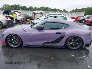 2021 Toyota Supra 3.0 z VIN WZ1DB0C03MW040150, wystawiony jako IAAI lot #42704929 z przebiegiem 15 076 mil mil oraz . Historia ofert i sprzedaży dostępna na DreamBid. Obrazek 14.