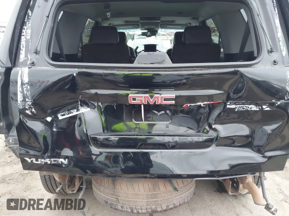 2015 GMC Yukon SLT with VIN 1GKS1BKC3FR129173, listed as a IAAI auction lot 41795585 with 97,893 mi miles. Bid and sale history available at carsss.com. Image 20.