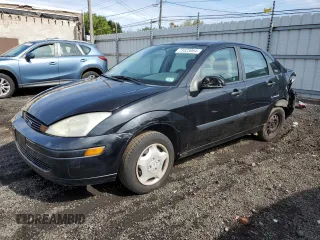 2002 Ford Focus LX with VIN 1FAFP33P72W239485, listed as a Copart auction lot 73323084 with 94,876 mi miles and Non Repairable. Bid and sale history available at carsss.com. Image 1.