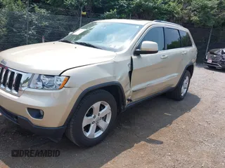 2011 Jeep Grand Cherokee Laredo with VIN 1J4RR4GG0BC713919, listed as a IAAI auction lot 42425229 with 139,379 mi miles and . Bid and sale history available at DreamBid. Image 2.