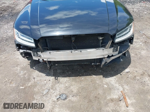 2015 Audi A8 3.0T with VIN WAU3GAFD6FN008993, listed as a IAAI auction lot 42239421 with 125,587 mi miles and . Bid and sale history available at DreamBid. Image 6.