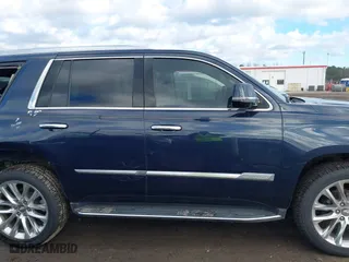 2019 Cadillac Escalade Luxury with VIN 1GYS3BKJXKR346874, listed as a IAAI auction lot 41212250 with 56,221 mi miles. Bid and sale history available at carsss.com. Image 14.
