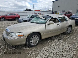 2005 Lincoln Town Car Signature Limited z VIN 1LNHM82W25Y620232, wystawiony jako Copart lot #57701395 z przebiegiem 263 977 mil mil oraz Nie do naprawy. Historia ofert i sprzedaży dostępna na DreamBid. Obrazek 1.