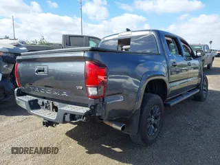 2020 Toyota Tacoma SR5 with VIN 3TMAZ5CN6LM139744, listed as a IAAI auction lot 41690662 with 68,053 mi miles and . Bid and sale history available at DreamBid. Image 4.