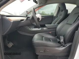 2023 Tesla Model Y Long Range z VIN 7SAYGAEE9PF686434, wystawiony jako Copart lot #54593475 z przebiegiem Nie podano mil oraz Szkoda całkowita • Salvage title. Historia ofert i sprzedaży dostępna na DreamBid. Obrazek 7.