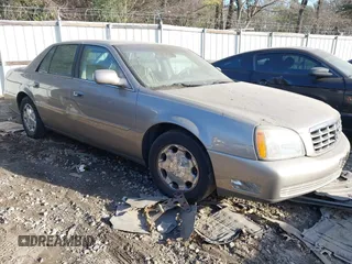 2002 Cadillac DeVille DHS z VIN 1G6KE57Y22U225134, wystawiony jako IAAI lot #41350531 z przebiegiem 126 457 mil mil oraz . Historia ofert i sprzedaży dostępna na DreamBid. Obrazek 1.