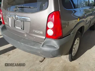 2006 Mazda Tribute i with VIN 4F2YZ02Z26KM12180, listed as a IAAI auction lot 41959606 with 228,217 mi miles and . Bid and sale history available at DreamBid. Image 6.