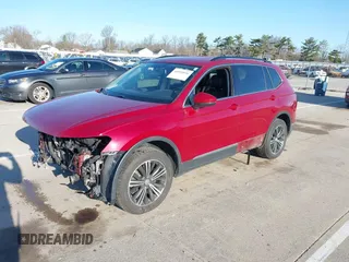 2018 Volkswagen Tiguan SEL z VIN 3VV2B7AX6JM039344, wystawiony jako IAAI lot #41934536 z przebiegiem 93 838 mil mil oraz . Historia ofert i sprzedaży dostępna na DreamBid. Obrazek 19.