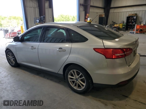 2018 Ford Focus SE z VIN 1FADP3FE9JL234158, wystawiony jako Copart lot #51788755 z przebiegiem 99 877 mil mil oraz Szkoda całkowita • Salvage title. Historia ofert i sprzedaży dostępna na DreamBid. Obrazek 2.