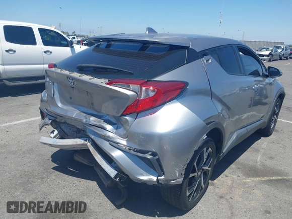 2018 Toyota C-HR XLE z VIN NMTKHMBX2JR057798, wystawiony jako IAAI lot #42327724 z przebiegiem 115 715 mil mil oraz . Historia ofert i sprzedaży dostępna na DreamBid. Obrazek 4.