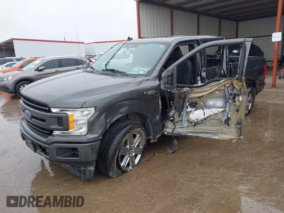 2019 Ford F-150 XL with VIN 1FTEW1C56KKC31025, listed as a IAAI auction lot 41452618 with 153,422 mi miles and . Bid and sale history available at DreamBid. Image 2.
