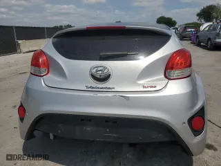2014 Hyundai Veloster Turbo with VIN KMHTC6AE0EU192680, listed as a Copart auction lot 54486575 with 129,949 mi miles and Clean Title. Bid and sale history available at carsss.com. Image 6.